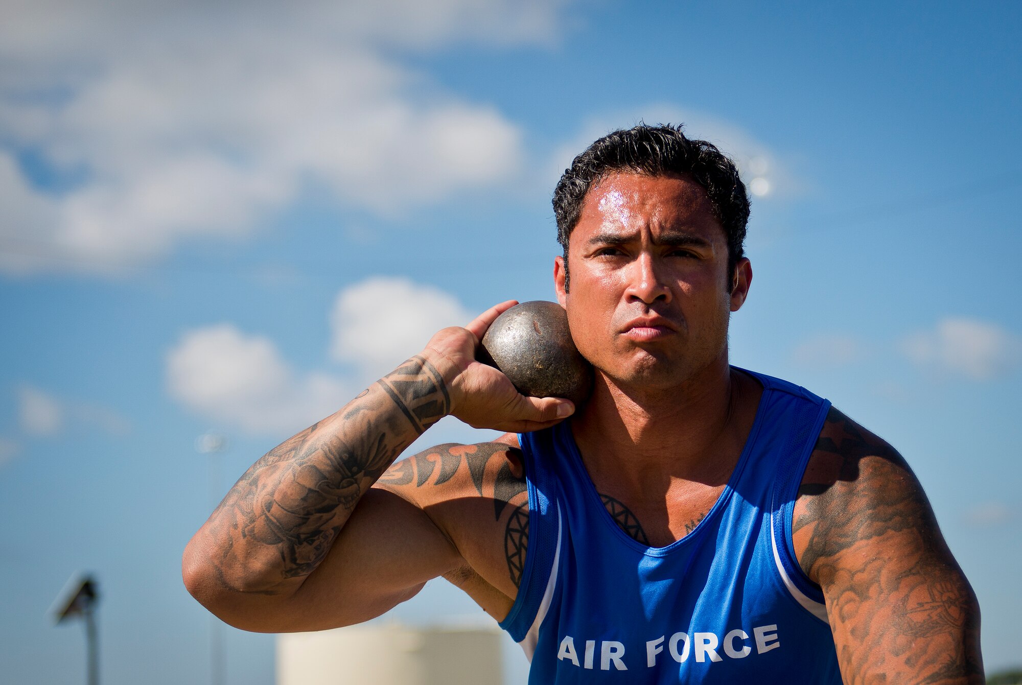 Christopher Ferrell, a Warrior Games athlete, prepares to make his toss during a morning track and field session at the Air Force team’s training camp at Eglin Air Force Base, Fla., April 7. The base-hosted, week-long Warrior Games training camp is the last team practice session before the yearly competition in June. (U.S. Air Force photo/Samuel King Jr.)