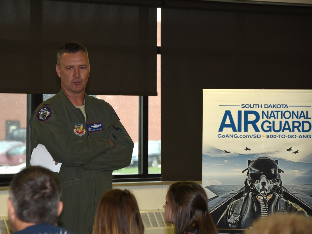 SIOUX FALLS, S.D. - Col. Nate Alholinna, 114th Fighter Wing vice commander, speaks to students and their parents during Career Day held at Joe Foss Field, S.D. April 6, 2016.  Twice a year, the South Dakota Air National Guard recruiters invite young adults and their parents to the base for a chance to learn more about the career opportunities available to them and to speak directly with unit members about their experiences. (U.S. Air National Guard photo by Senior Master Sgt. Nancy Ausland/Released)