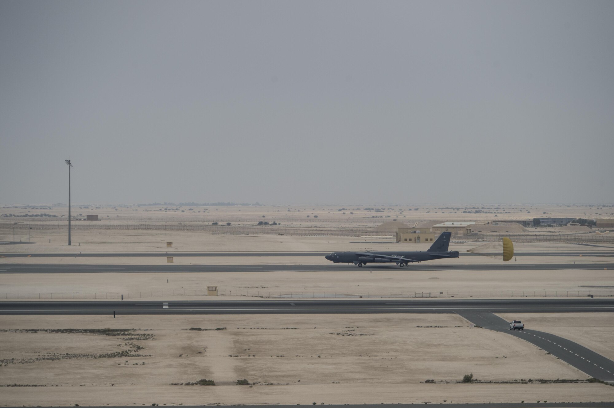 A B-52 Stratofortress from Barksdale Air Force Base, Louisiana, touches down at Al Udeid Air Base, Qatar, April 9, 2016. The B-52 offers diverse capabilities including the delivery of precision weapons. The aircraft and its crew have deployed in support Operation Inherent Resolve. This deployment is the first basing of the B-52s in the U.S. Central Command area of responsibility in 26 years. (U.S. Air Force photo by Staff Sgt. Corey Hook/Released)