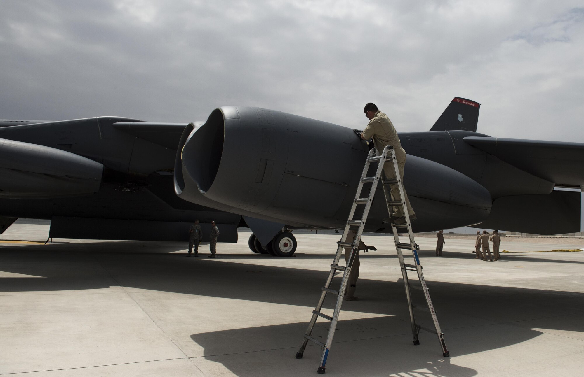 Tech. Sgt. Walter, assigned to the 36th Expeditionary Aircraft Maintenance Squadron at Barksdale Air Force Base, La., inspects a B-52 Stratofortress that arrived at Al Udeid Air Base, Qatar, April 9, 2016, to support Operation Inherent Resolve. The 19-nation air coalition consists of numerous precision strike aircraft and the B-52s will bring their unique capabilities to the fight against The Islamic State of Iraq and the Levant. The B-52 is a long-range heavy bomber that can perform a variety of missions including strategic attack, close-air support, air interdiction and maritime operations. (U.S. Air Force photo/Tech. Sgt. Nathan Lipscomb)