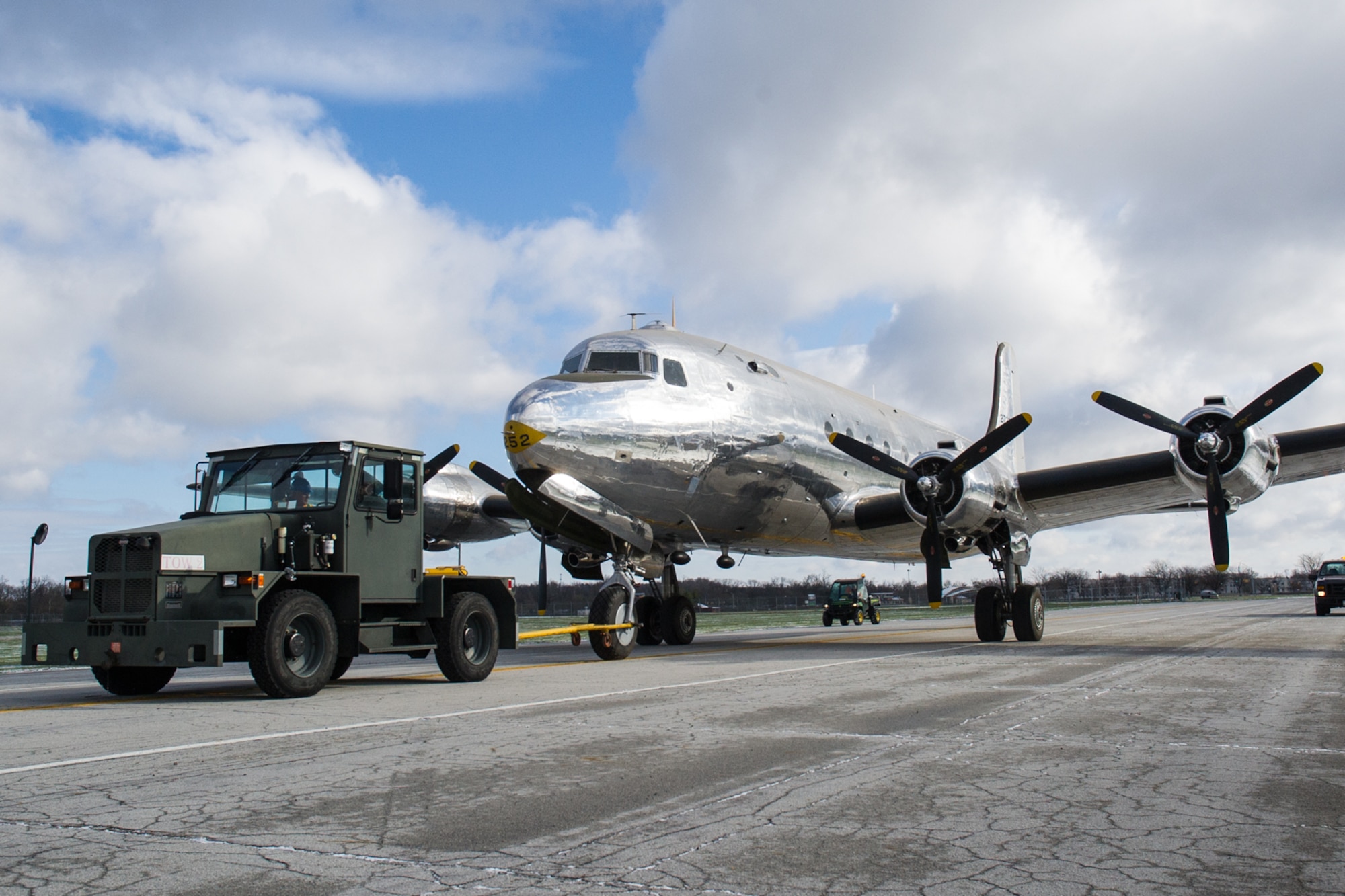 DAYTON, Ohio -- The VC-54C Sacred Cow being towed into the fourth building at the National Museum of the United States Air Force on April 9, 2016. (U.S. Air Force photo by Ken LaRock)