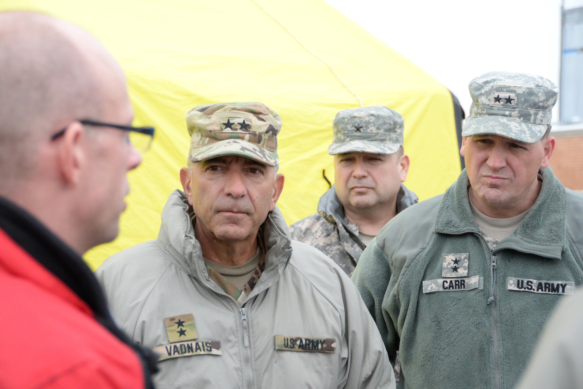 U.S. Army Major General Courtney P. Carr, right, The Adjutant General of Indiana, and U.S. Army Major General Gregory J. Vadnais, center, The Adjutant General and the Director of Military and Veterans Affairs for Michigan, meet with Chris Rosser, left, Medical Control/Trauma Program Manager at Munson Healthcare Grayling Hospital, as they are shown the medical capabilities of the hospital, as well as the 19th CBRNE Enhanced Response Force Package in Grayling, Mich., April 6, 2016. (U.S. Air National Guard photo by Airman 1st Class Kevin D. Schulze)