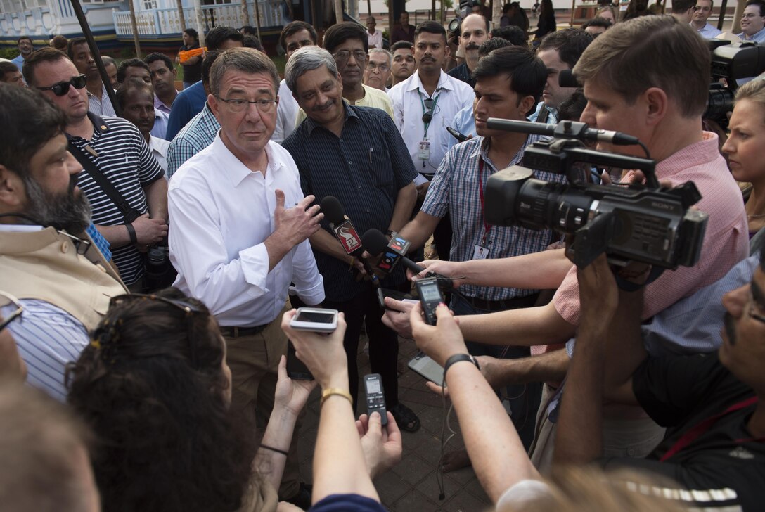 Defense Secretary Ash Carter speaks with reporters after touring the Mangeshi Temple with Indian Defense Minister Manohar Parrikar, right, in Goa, India, April 10, 2016. Carter is visiting India to solidify the rebalance to the Asia-Pacific region. DoD photo by Air Force Senior Master Sgt. Adrian Cadiz