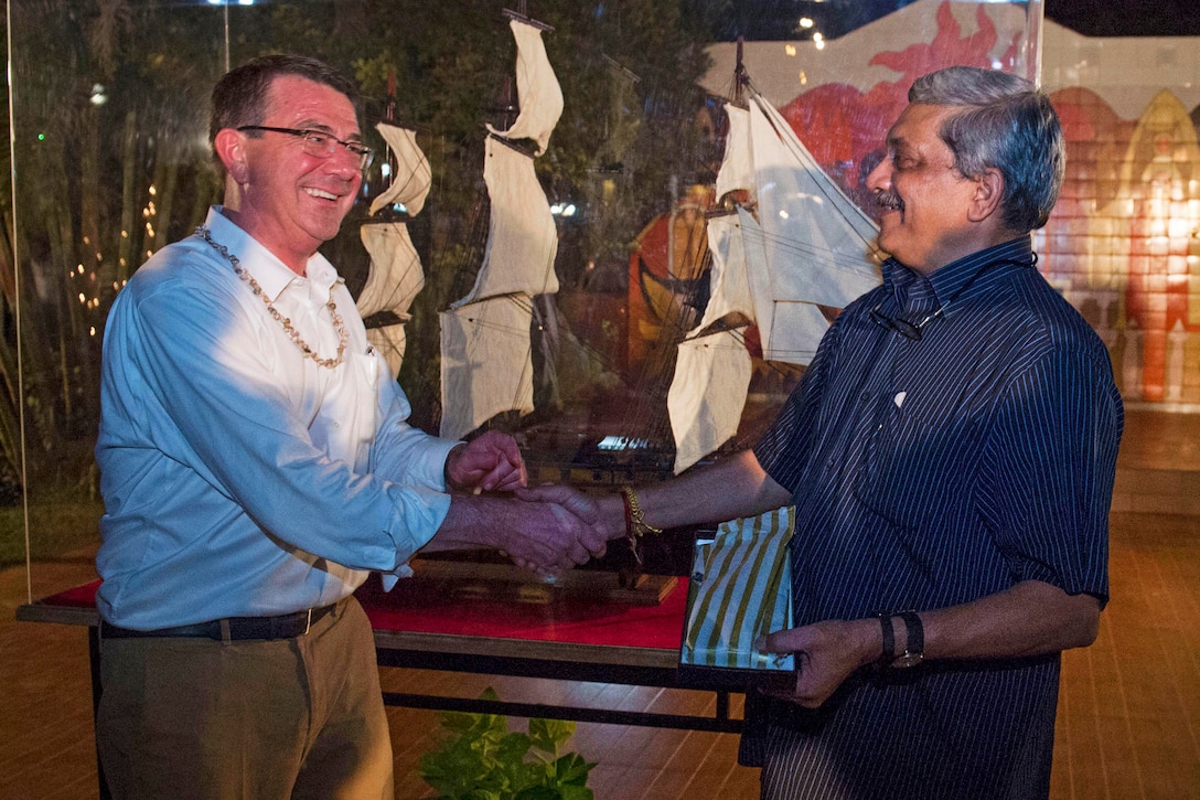 Defense Secretary Ash Carter exchanges gifts with Indian Defense Minister Manohar Parrikar in Goa, India, April 10, 2016. Carter is visiting India to solidify the rebalance to the Asia-Pacific region. DoD photo by Air Force Senior Master Sgt. Adrian Cadiz