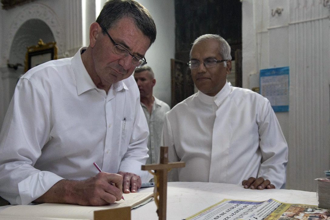 Defense Secretary Ash Carter signs the guest book at Basilica of Bom Jesus in Goa, India, April 10, 2016. Carter is visiting India to solidify the U.S. rebalance to the Asia-Pacific region. DoD photo by Air Force Senior Master Sgt. Adrian Cadiz