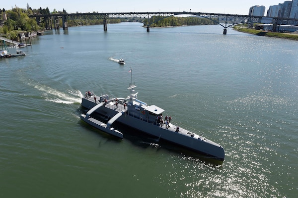 Sea Hunter, a new class of unmanned ocean-going vessel gets underway on the Williamette River, Portland, Ore., April 7, 2017, following a christening ceremony attended by Deputy Defense Secretary Bob Work. The vessel is part the of the Defense Advanced Research Projects Agency‘s Anti-Submarine Warfare Continuous Trail Unmanned Vessel program.  Navy photo by John F. Williams