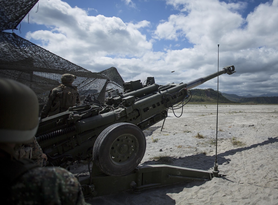 U.S. and Philippine Marines fire a M777 Howitzer for artillery training Crow Valley, Philippines, April 8, 2016. U.S. and Philippine Marines trained together on firing procedures for the M777 Howitzer to build their combined capabilities. Balikatan is an annual Philippines-U.S. military bilateral training exercise that is a signature element of the Philippine-U.S. alliance focused on a variety of missions to include humanitarian assistance maritime law enforcement, and environment protection.