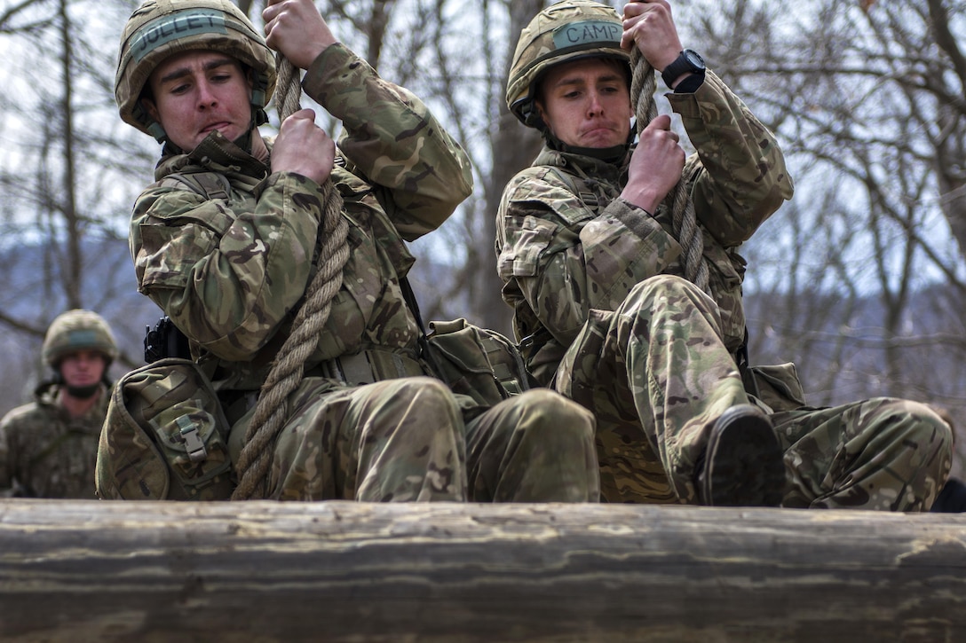 Officer Cadets Perry Jolly and Samuel Camp practice the rope swing before the 2016 Sandhurst competition at theU.S. Military Academy, West Point, N.Y., April 6, 2016. Jolly and Camp are assigned to the Royal Military Academy Sandhurst, United Kingdom. Army photo by Sgt. 1st Class Brian Hamilton