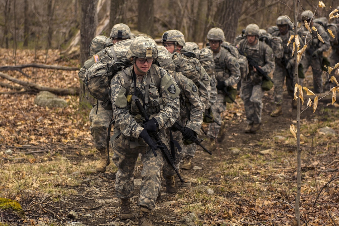 A team of cadets make the 6 mile trek across the Appalachian Mountain range to their second station, rifle marksmanship during the 2016 Sandhurst competition at the U.S. Military Academy, West Point, N.Y., April 8, 2016. The cadets are assigned to the United States Military Academy. Army photo by Sgt. 1st Class Brian Hamilton