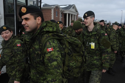 Soldiers with 2 Canadian Mechanized Brigade Group, 4th Canadian Division headquartered in Petawawa, Ontario, arrive at Camp Atterbury, Indiana, for in-processing before taking part in the 38th Division Warfighter Exercise on Jan. 26, 2015. Canadian forces drilled over the recent weekend with counterparts from the Arizona National Guard.