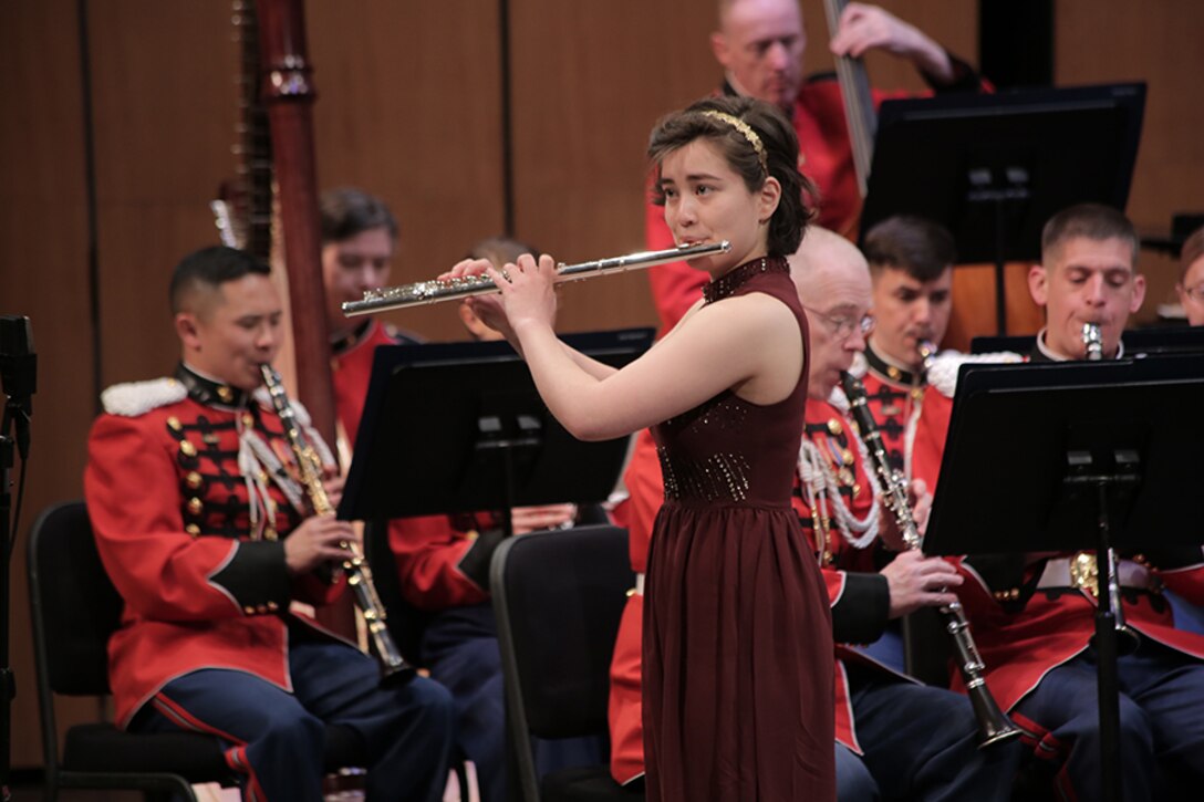 On Sunday, April 10, 2016, the Marine Band performed a concert titled "State of Mind." Each of these selections highlighted some mental state, whether it is the pride felt serving as a Marine, the harried and frantic state of mind most everyone has experienced at some point, or the meditative, trance-like state that Michael Gandolfi’s Flourishes and Meditations can achieve through each performance. The program culminated with Dana Wilson’s Piece of Mind where each movement represents the workings of the human mind. Also, the concert featured a solo performance by flutist Mei Stone, the 2016 Marine Band Concerto Competition winner.