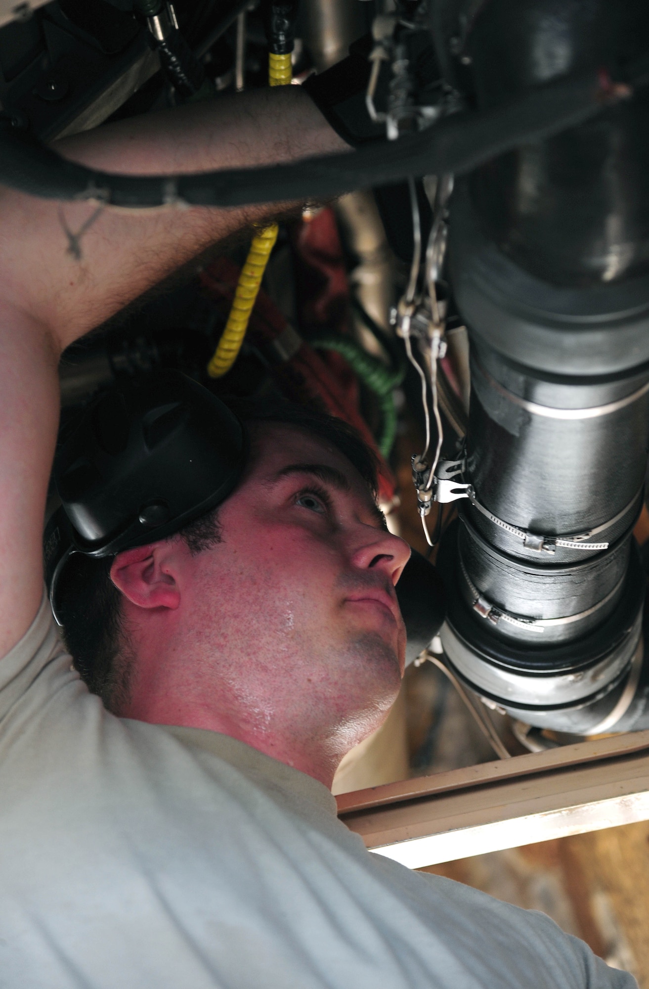 U.S. Air Force Staff Sgt. James Torrance, an electrical and environmental systems technician with the 131st Aircraft Maintenance Squadron, performs maintenance on a B-2 Spirit while deployed to an undisclosed location in the U.S. Pacific Command area of operations March 11, 2016. These deployments help maintain global stability and security, while enabling aircrew to become familiar with operating in different regions. (U.S. Air Force photo by Senior Airman Joel Pfiester)