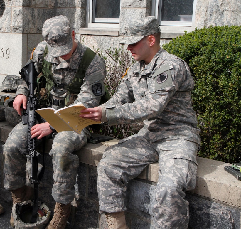 Sgt. Richard Libby, Co. B, 3rd Bn., 304th Inf. Reg. (USMA) 104th Training Div. (LT) (center) instructs a United States Military Command (USMA Cadet on weapon operations prior to the annual Sandhurst Competition held at the United States Military Academy Apr. 8-9, 2016. The Sandhurst Competition is an annual event held at the United States Military Academy (USMA where the cadets of military academies from around the world compete in a variety of Soldier skills in which Non-Commissioned Officers of Companies A and B of the 3rd Bn., 304th Inf. Reg. (USMA) both mentor and evaluate the Cadets on their performance. (U.S. Army photo by Sgt. Javier Amador) (released)