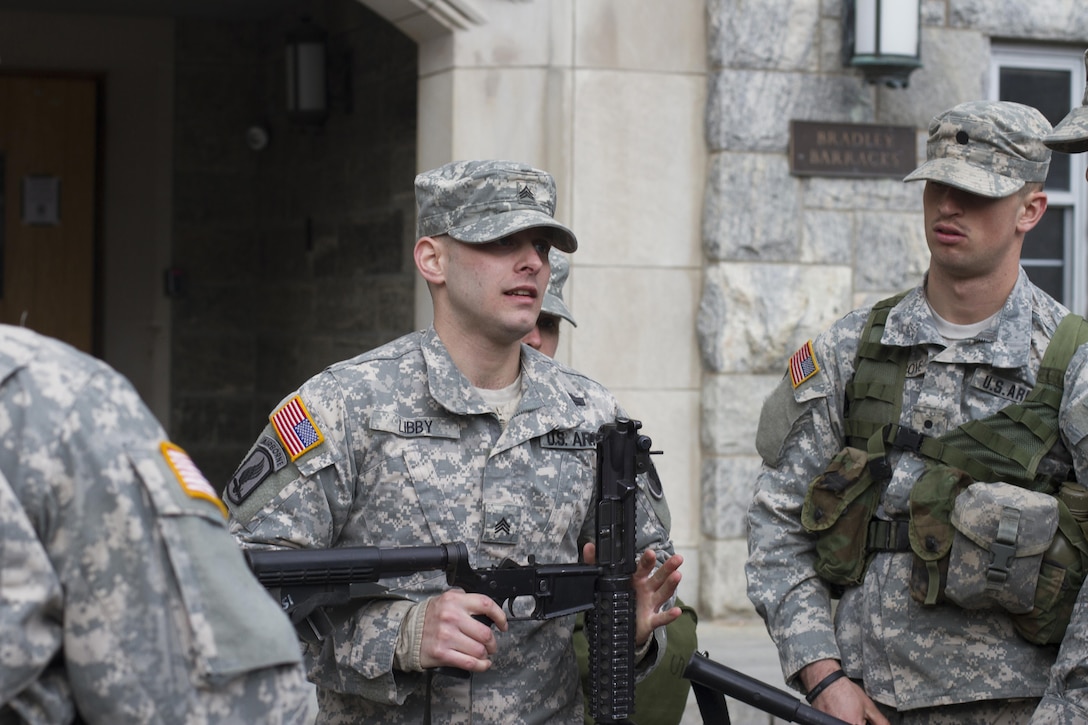 Sgt. Richard Libby, Co. B, 3rd Bn., 304th Inf. Reg. (USMA) 104th Training Div. (LT) (center) instructs United States Military Command (USMA) Cadets on how to properly disassemble their M-4 assault rifles for cleaning prior to the annual Sandhurst Competition held at the United States Military Academy Apr. 8-9, 2016. The Sandhurst Competition is an annual event held at the United States Military Academy (USMA where the cadets of military academies from around the world compete in a variety of Soldier skills in which Non-Commissioned Officers of Companies A and B of the 3rd Bn., 304th Inf. Reg. (USMA) both mentor and evaluate the Cadets on their performance. (U.S. Army photo by Sgt. Javier Amador) (released)