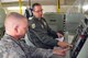 Tech. Sgt. Tom Kocis, 910th Maintenance Squadron aerial spray maintainer, observes Tech. Sgt. Richard Demchuk, 757th Airlift Squadron loadmaster, operate the controls of a Modular Aerial Spray System (MASS) in a hangar here, April 3, 2016. Demchuk was completing a specialized certification to perform his dual role as a MASS operator for the Department of Defense’s only aerial spray capability. For more information about the 910th Airlift Wing’s Air Force Reserve special mission, click on the following link: http://www.youngstown.afrc.af.mil/About/FactSheets/Display/tabid/865/Article/178927/aerial-spray-mission.aspx (U.S. Air Force photo/Master Sgt. Bob Barko Jr.)