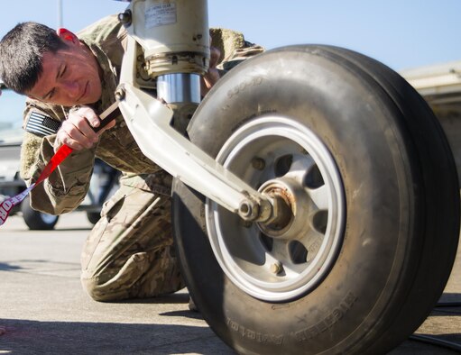 Staff Sgt. Sean Smith-Ogara, 919th Special Operations Maintenance Group, performs an inspection on the nose landing gear of a C-145A Skytruck during some routine maintenance on the flightline at Duke Field Fla., Feb. 25.  Smith-Ogara is part of the avionics shop of the 919th Special Operations Maintenance Group.  (U.S. Air Force photo/Tech. Sgt. Sam King)