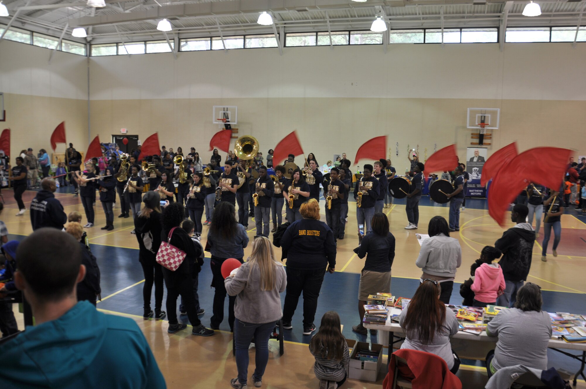 The Eastern Wayne High School marching band performs during the Month of the Military Child Carnival April 9, 2016 at Seymour Johnson Air Force Base, North Carolina. Along with the band, a disc jockey, magician and several TV characters entertained more than 200 members of Team Seymour as part of the annual celebration. (U.S. Air Force photo/Staff Sgt. Chuck Broadway)