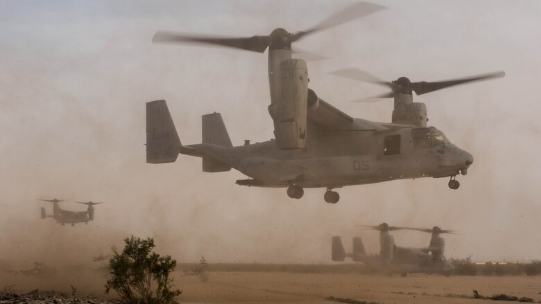 Three Ospreys, two with Marine Medium Tiltrotor Squadron 364 “Purple Foxes” and one with VMM-165 “White Knights,” conduct a division confined area landing in Southern California, April 5. Marines with VMM-364 and VMM-165 conducted division confined area landings to build and maintain the pilots’ and air crew’s proficiency in performing the landings. 