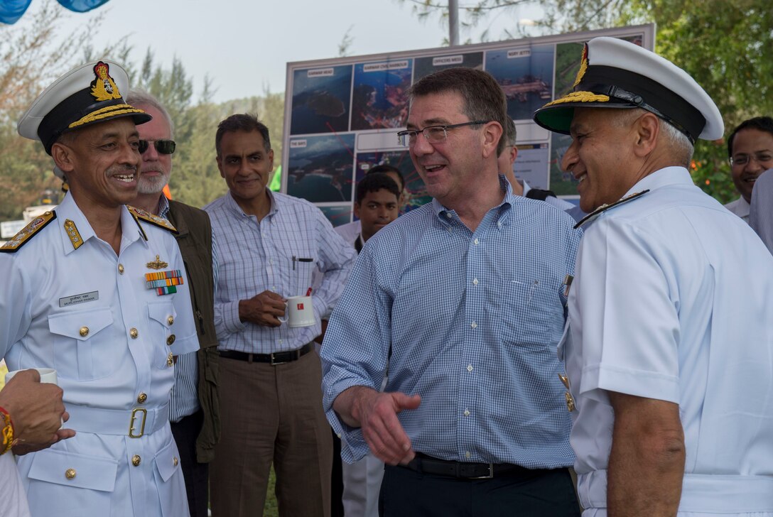 Defense Secretary Ash Carter, center right, speaks with Indian naval officers as he arrives at the Karwar naval base in India to visit the Indian aircraft carrier INS Vikramaditya, April 11, 2016. Carter is visiting India to solidify the rebalance to the Asia-Pacific region. DoD photo by Air Force Senior Master Sgt. Adrian Cadiz