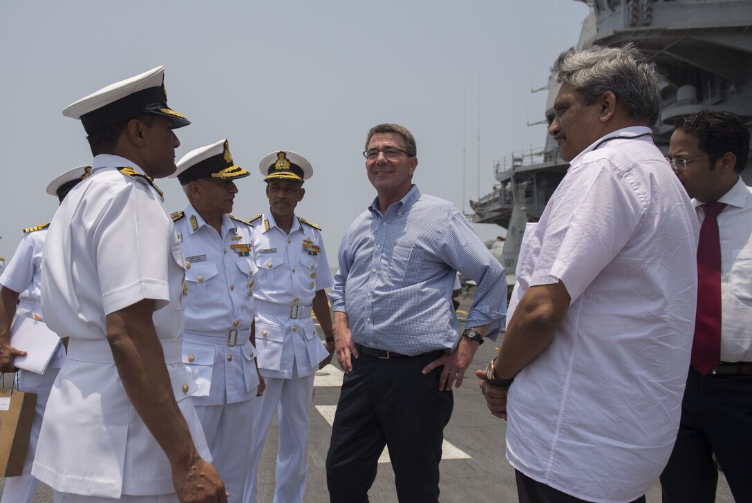 Defense Secretary Ash Carter speaks with Indian Defense Minister Manohar Parrikar and Indian naval officers during a tour of the Indian aircraft carrier INS Vikramaditya at the Karwar naval base in India, April 11, 2016. DoD photo by Air Force Senior Master Sgt. Adrian Cadiz