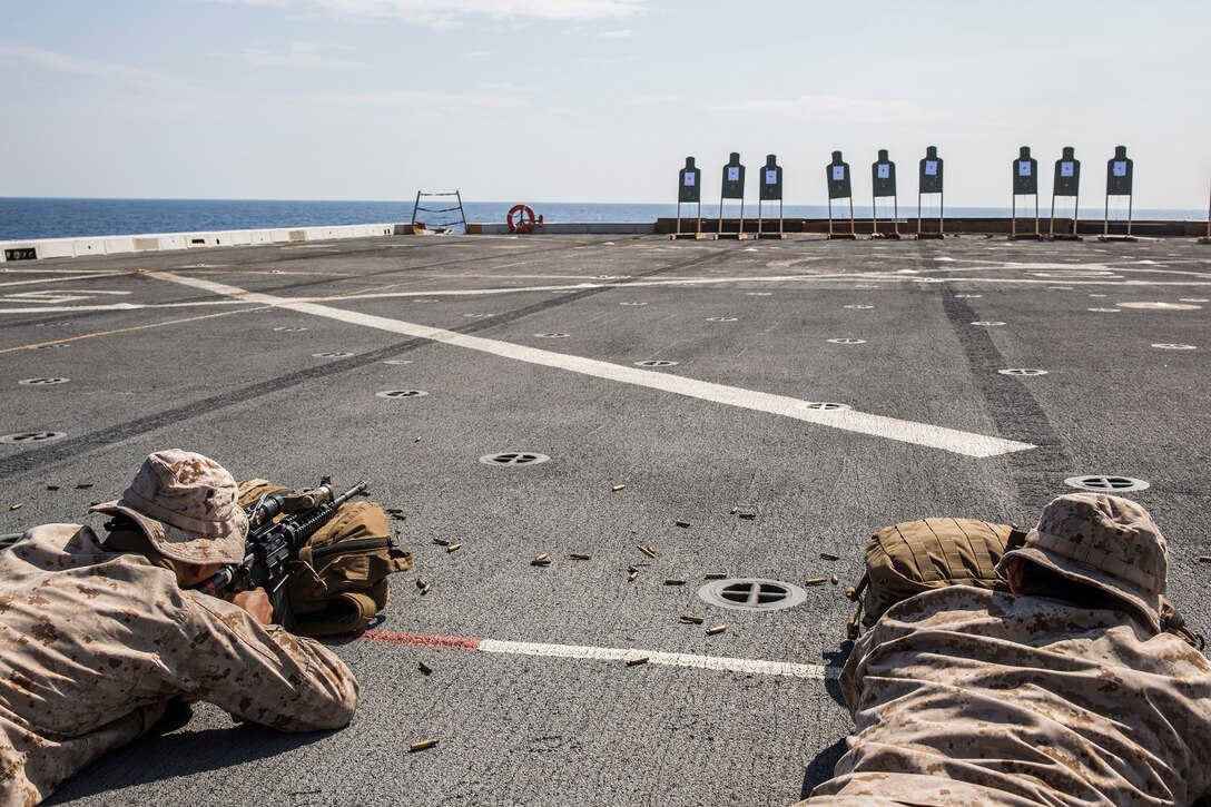 U.S. Marines with the 13th Marine Expeditionary Unit conduct a live-fire range to calibrate their rifle combat optics aboard the USS New Orleans, Indian Ocean, Apr. 2, 2016. The Boxer Amphibious Ready Group/13th MEU team is currently deployed to the 5th Fleet area of responsibility to support regional stability and security.(U.S. Marine Corps photo by Lance Cpl. Alvin Pujols/RELEASED)