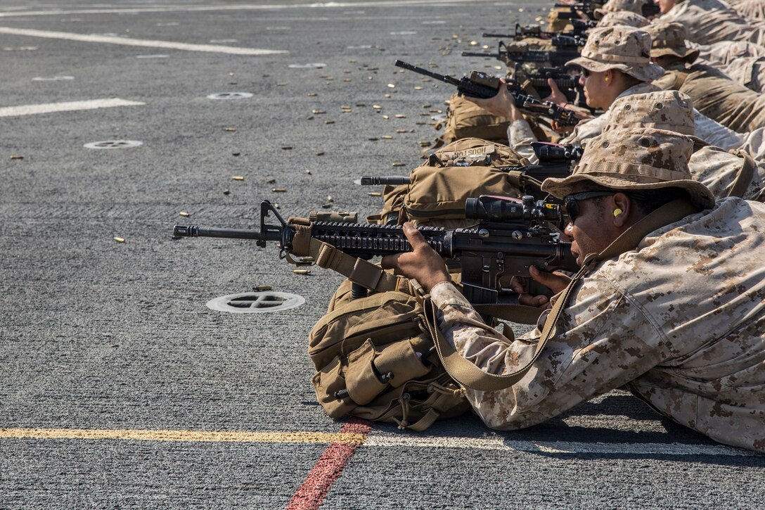 U.S. Marines with the 13th Marine Expeditionary Unit conduct a live-fire range to calibrate their rifle combat optics aboard the USS New Orleans, Indian Ocean, Apr. 2, 2016. The Boxer Amphibious Ready Group/13th MEU team is currently deployed to the 5th Fleet area of responsibility to support regional stability and security.(U.S. Marine Corps photo by Lance Cpl. Alvin Pujols/RELEASED)