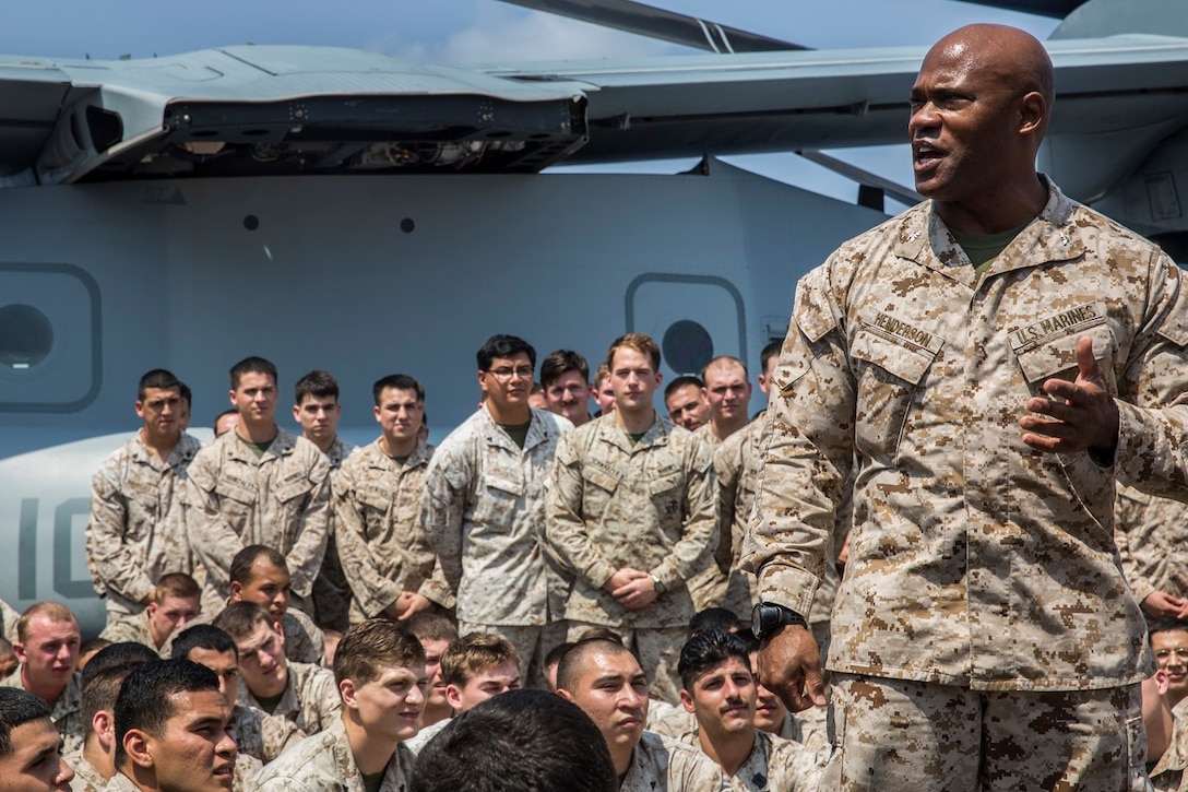 Colonel Anthony M. Henderson, commanding officer of the 13th Marine Expeditionary Unit, addresses the Marines and Sailors aboard the USS New Orleans, Arabian Sea, Apr. 4, 2016. The Boxer Amphibious Ready Group/13th MEU team is currently deployed to the 5th Fleet area of responsibility to support regional stability and security. (U.S. Marine Corps photo by Lance Cpl. Alvin Pujols/RELEASED)