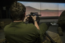 A cadet with the Argyll and Sutherland Highlanders of Canada Regimental Cadet Corps shoots the MK19 40mm grenade launcher during a visit to the Battle Skills Training School, operated by the 2nd Marine Logistics Group, at Camp Lejeune, N.C., March 15, 2016. A total of 46 cadets visited the base and multiple units as part of an educational tour to better understand of how foreign militaries function. (U.S. Marine Corps photo by Lance Cpl. Preston McDonald/Released)