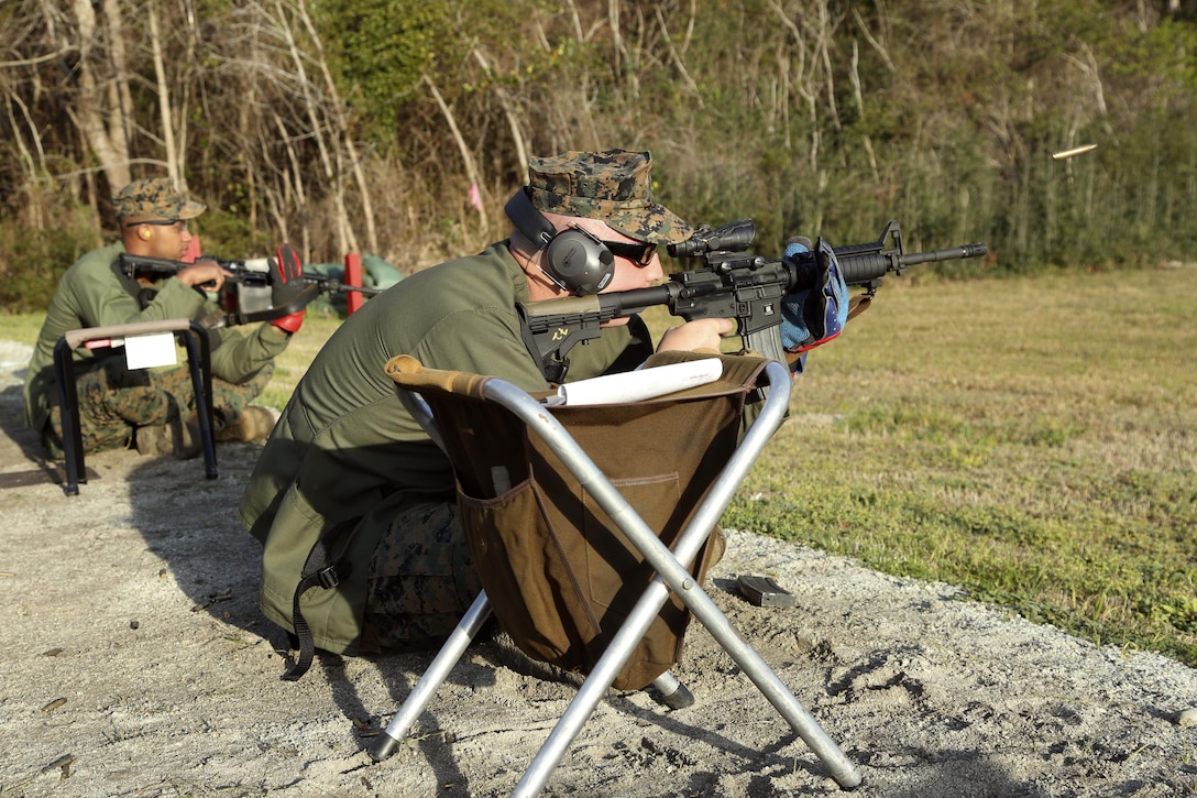 Marines with the Marine Security Augmentation Unit fire ten rounds in the rapid fire during the Eastern Division Shooting Matches at Stone Bay Rifle Range on Marine Corps Base Camp Lejeune March 24. During the ten-day competition, shooters compete to earn individual shooting medals and team trophies while improving on the fundamentals of marksmanship with the M16A4 and M4 service rifles and M9 service pistol.(U.S. Marine Corps photo by Cpl. Mark Watola /released)