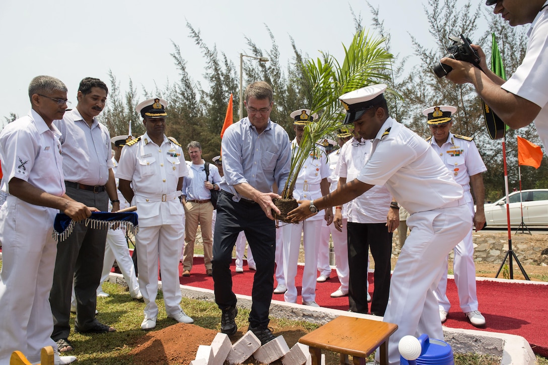 Defense Secretary Ash Carter helps plant a tree at the Karwar naval base in India, April 11, 2016, to represent U.S.-India friendship. Carter is visiting India to solidify the rebalance to the Asia-Pacific region. DoD photo by Air Force Senior Master Sgt. Adrian Cadiz