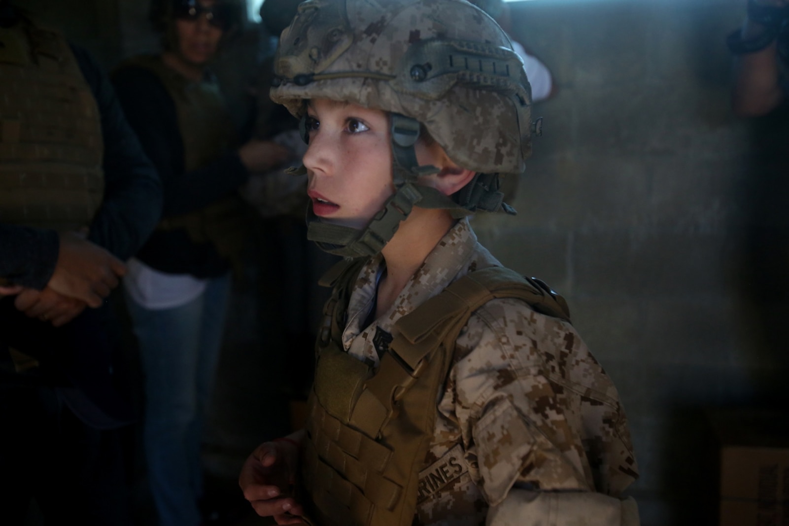 Nathan Aldaco, a 12 year-old boy with hypoplastic left heart syndrome, gets a safety brief before watching explosives detonate during a Make-A-Wish event supported by 7th Engineer Support Battalion, 1st Marine Logistics Group, aboard Camp Pendleton, Calif., March 24, 2016. Marines with 7th ESB and Explosive Ordnance Disposal helped to make Nathan’s wish of becoming a Marine come true by demonstrating the capabilities of their EOD robots and detonating TNT, C4, dynamite and blasting caps, while the heavy equipment operators gave him the opportunity to ride the D7 dozer and the excavator, in which he dug a pit, built a berm, and broke several large tree trunks.  (U.S. Marine Corps photo by Sgt. Laura Gauna/released)