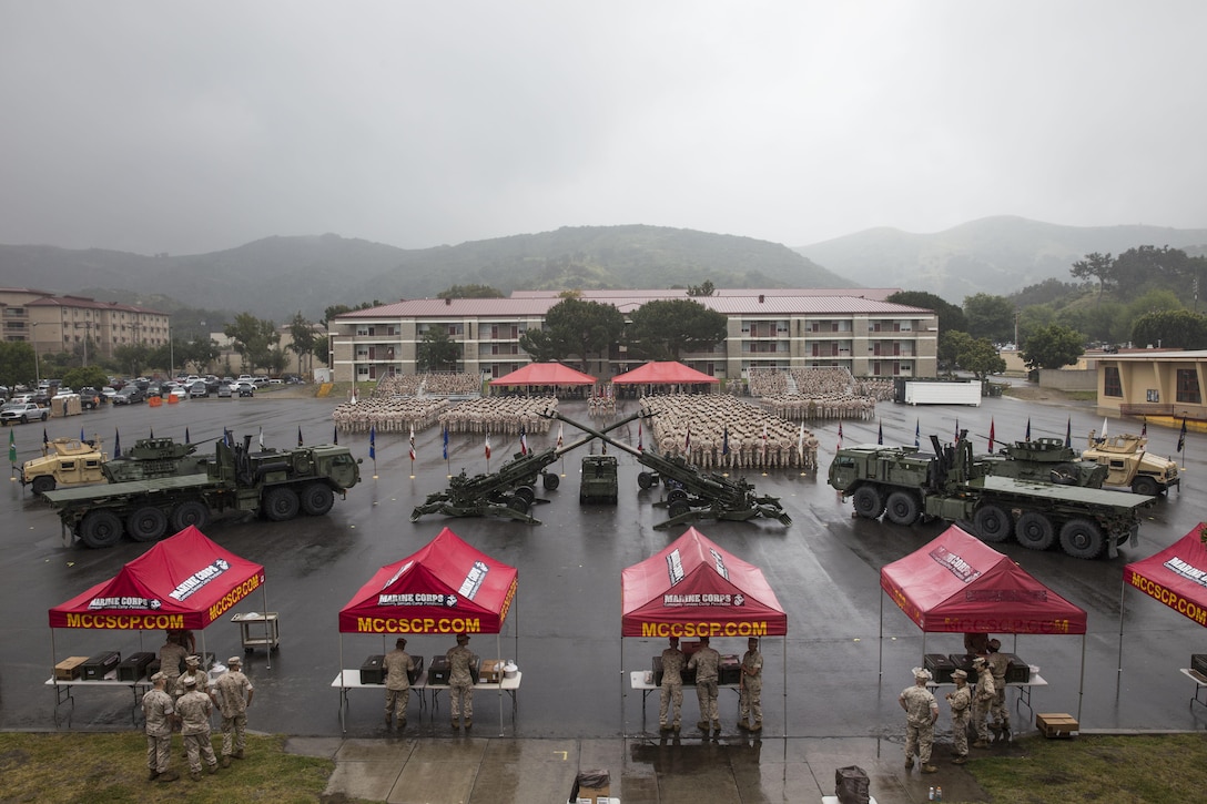 Marines gather for the 11th Marine Expeditionary Unit’s composite ceremony at Marine Corps Base Camp Pendleton, California, April 8, 2016. The ceremony marked the joining of the ground combat element, air combat element and logistics combat element into the MEU’s Marine Air-Ground Task Force before the MEU begins its intensive six-month training and certification period prior to their upcoming Western Pacific 16-2 deployment.