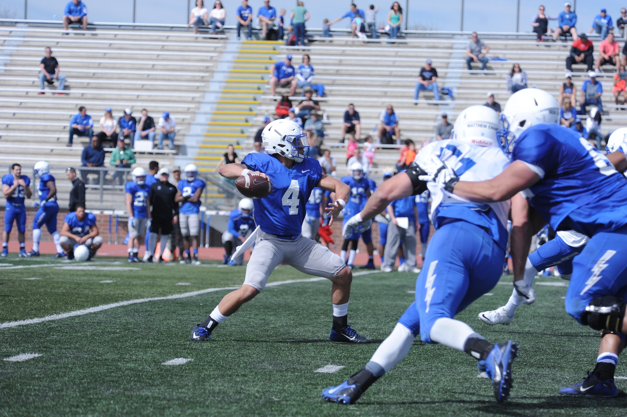 Freshman quarterback Ryan Brand steps back to unload during a pass-heavy team scrimmage to wrap up spring football at Fountain-Fort Carson High School Stadium April 9. (U.S. Air Force photo/John Van Winkle