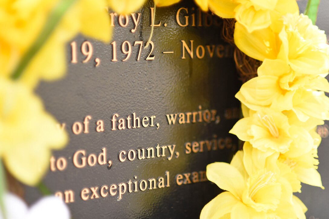 Ginger Gilbert visits the overpass dedicated to her husband at Luke Air Force Base April 8, 2016. The overpass was dedicated to Maj. Troy L. Gilbert, who died Nov. 27, 2006, when his F-16 Fighting Falcon crashed while he was providing close-air support to special operations forces about 40 miles north of Baghdad. Ginger travels the country speaking on behalf of the Folds of Honor Foundation, an organization that raises money for scholarships for children of service members killed in action. (U.S. Air Force photo by Staff Sgt. Staci Miller)