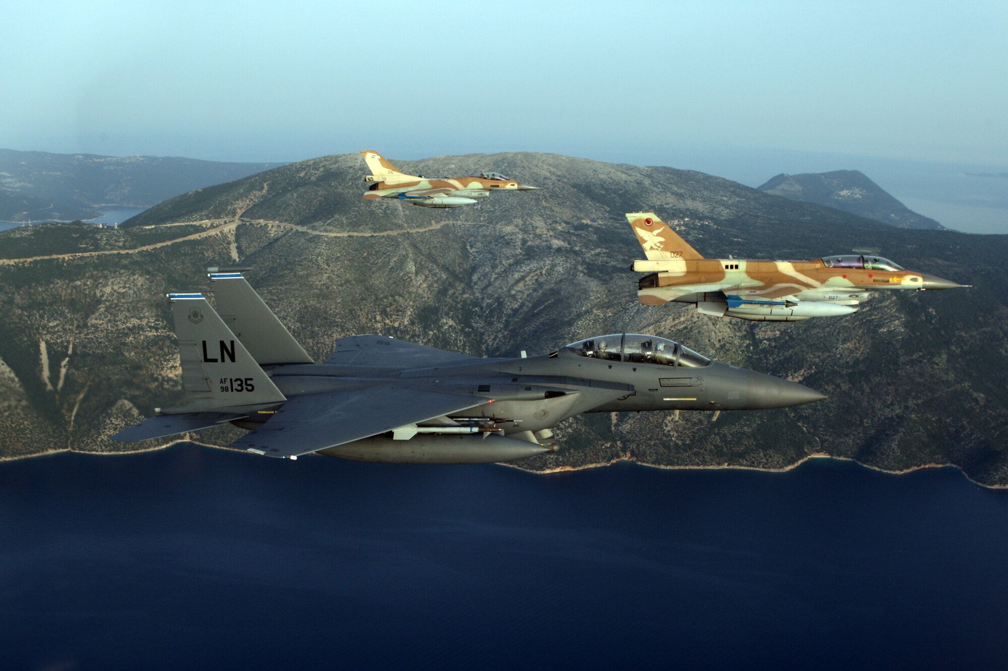 An F-15E Strike Eagle from the 492nd Fighter Squadron, Royal Air Force Lakenheath, England, flies in formation with Israeli air force F-16C and F-16D Fighting Falcon aircraft, April 7, 2016, during exercise INIOHOS 16. The Hellenic air force-hosted training event enhances interoperability, capabilities, and skills amongst allied and partner air forces. (Courtesy photo by Ioannis Lekkas/Released)