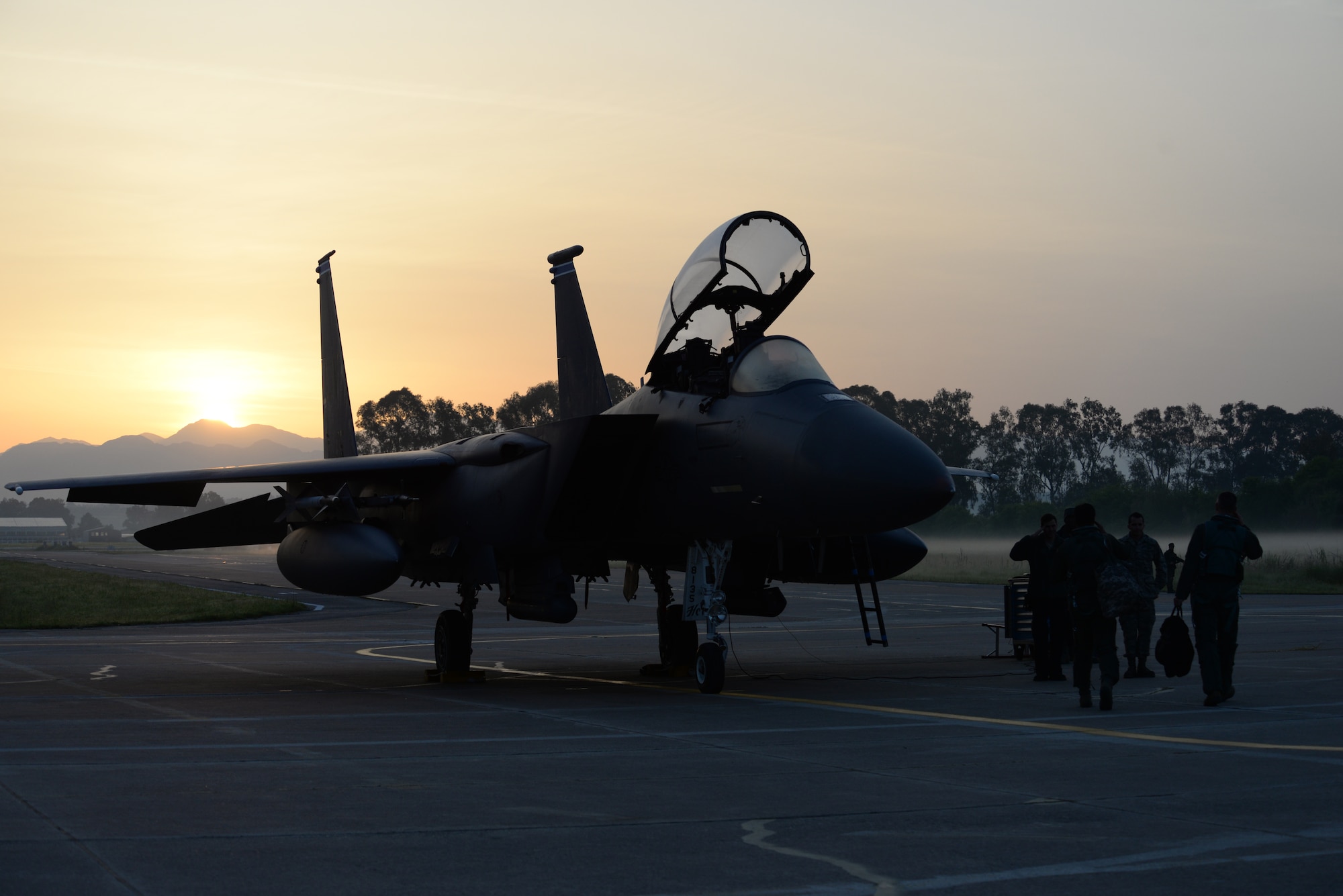 A pilot and weapon systems officer from the 492nd Fighter Squadron, Royal Air Force Lakenheath, England, step to their F-15E Strike Eagle aircraft for a sortie launch, April 7, 2016, during exercise INIOHOS 16 at Andravida Air Base, Greece. Twelve F-15E aircraft and approximately 260 U.S. Air Force Airmen are participating in the training event that also includes air forces from Greece and Israel. (U.S. Air Force photo by Tech. Sgt. Eric Burks/Released)