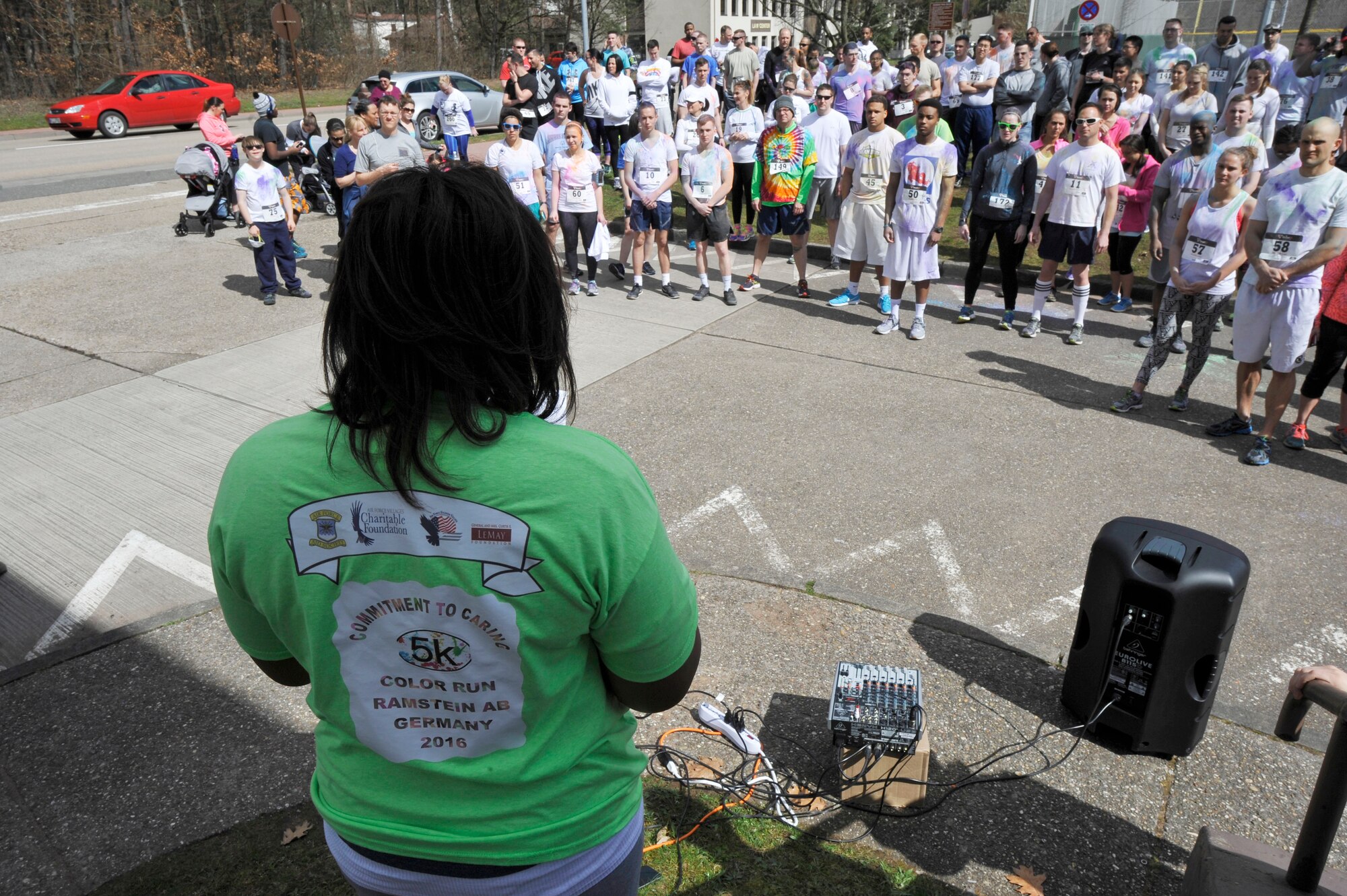 Runners from around the Kaiserslautern Military Community receive a safety brief and Air Force Assistance Fund brief prior to beginning the 5 kilometer color run April 7, 2016 at Ramstein Air Base, Germany. The AFAF is an annual campaign to raise money for four charitable affiliates which provide support to Air Force families in need. The campaign runs from March 21 to April 29. Contact your local AFAF representatives for additional information. (U.S. Air Force photo/Staff Sgt. Leslie Keopka)
