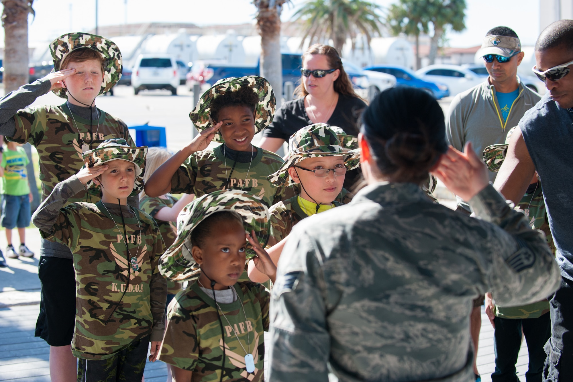 Children swear in to serve during “Kids Understanding Deployment Operations,” held in conjunction with Play for a Day at Patrick Air Force Base, Fla, April 9.  KUDOS helped children of military families gain an understanding of what their parents go through before deployment. The 45th Force Support Squadron kicked off “Month of the Military Child with these events for 45th Space Wing families. (U.S. Air Force photo by Benjamin Thacker/Released)