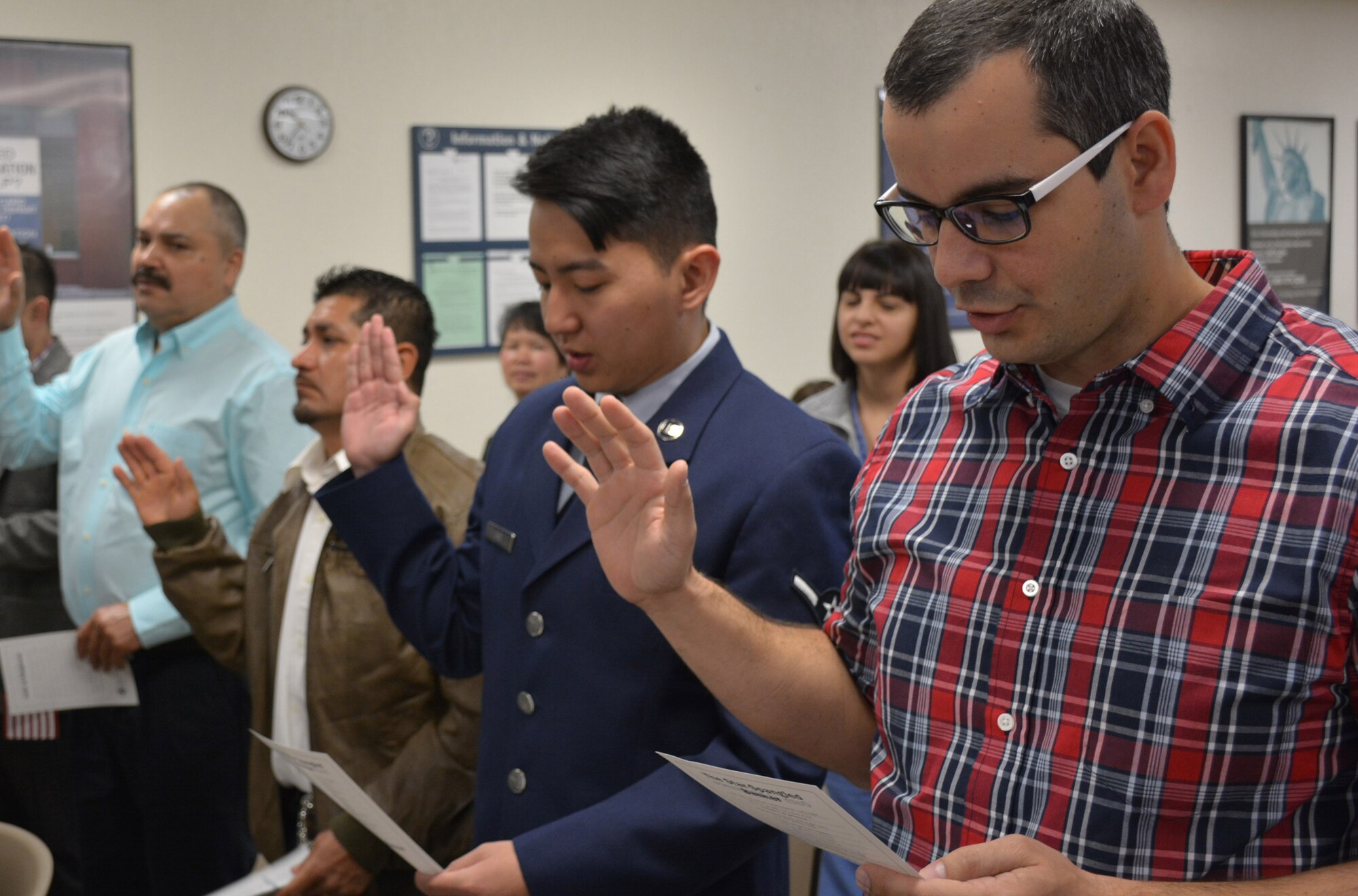 Airman Joon-Young Choi, a customer service processor in the 72nd Force Support Squadron’s Customer Service/ID Card Office, takes his Oath of Citizenship during a March 29 ceremony at the U.S. Citizenship and Immigration Services office in Oklahoma City. (Courtesy photo)