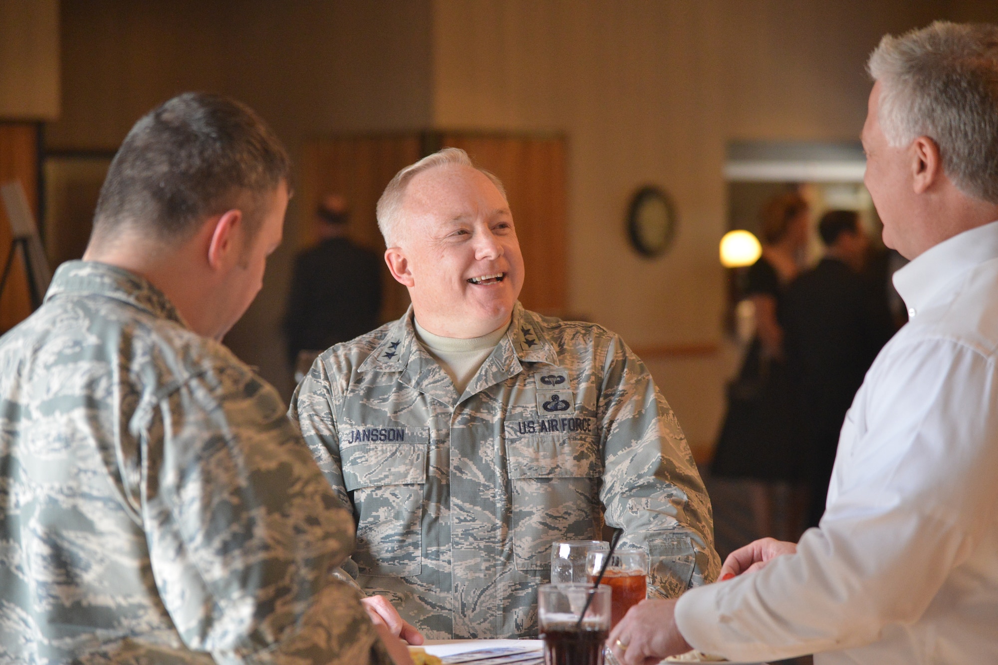 Maj. Gen. Scott Jansson, Air Force Nuclear Weapons Center commander, enjoys a laugh during a reception celebrating the AFNWC's 10th anniversary at the Mountain View Club April 7. The commander unveiled the Center's new motto at the reception: Never Doubted Always Feared. (Photo by Todd Berenger)