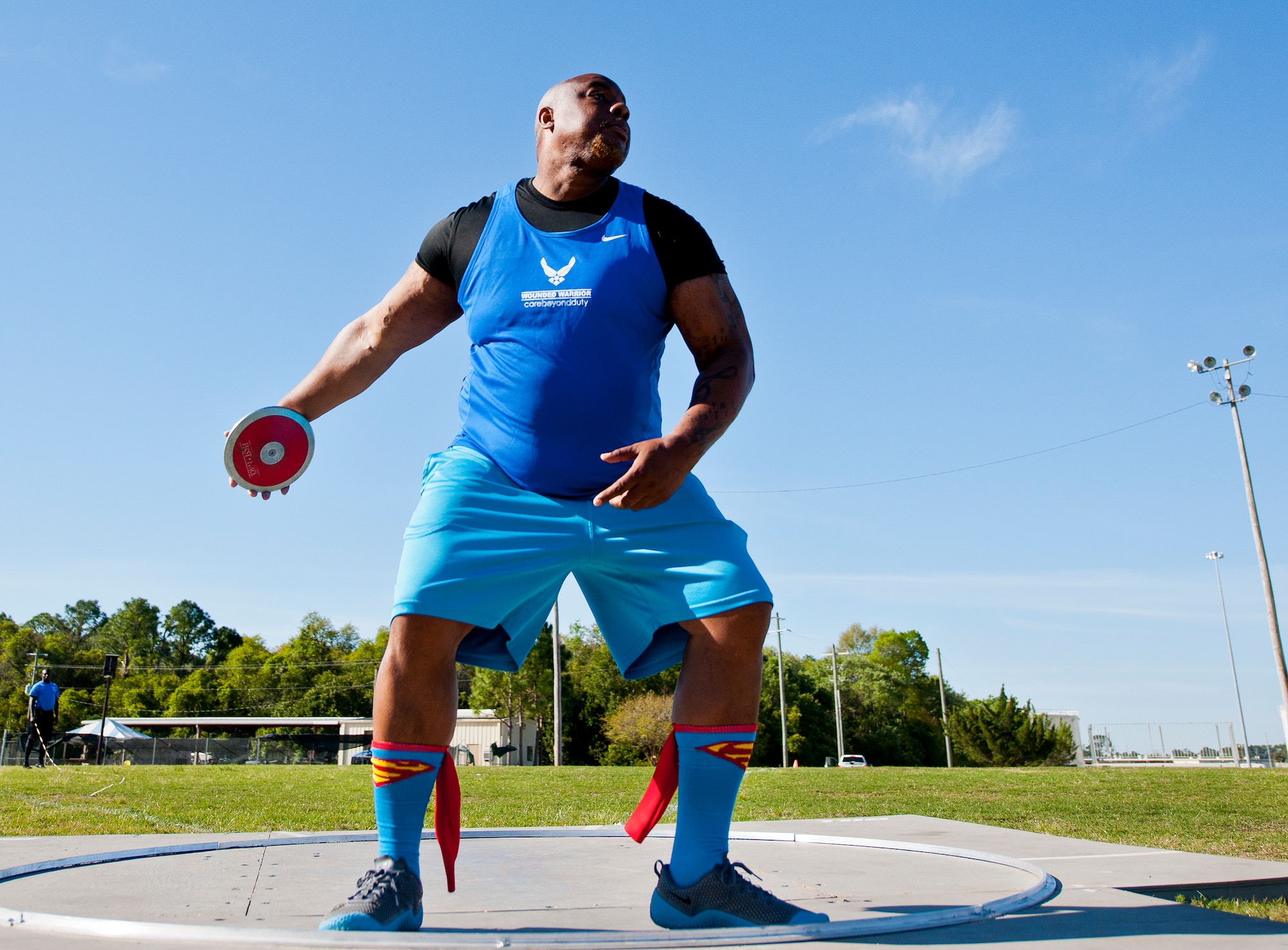 Nate Bias, a Warrior Games athlete, prepares to throw the discus during a morning track and field session at the Air Force team’s training camp at Eglin Air Force Base, Fla., April 8.  The base-hosted, week-long Warrior Games training camp was the last team practice session before the yearly competition in June.  (U.S. Air Force photo/Samuel King Jr.)