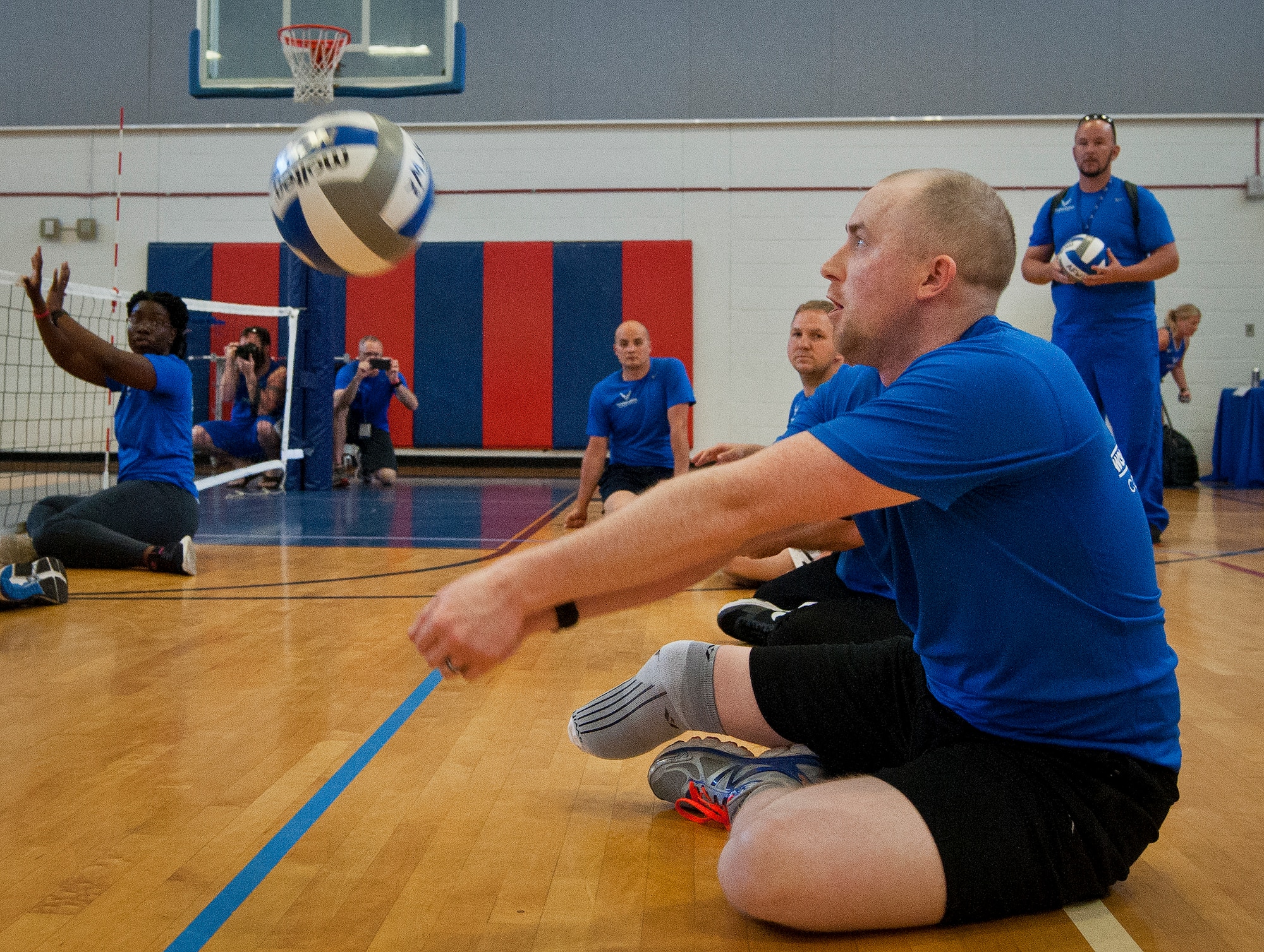 Austin Williamson, a Warrior Care attendee returns a serve during a sitting volleyball game on the final day of training camp at Eglin Air Force Base, Fla., April 8. The base hosted the week-long Wound Warrior Care event that helps recovering wounded, ill and injured military members through specific hand-on rehabilitative training.  (U.S. Air Force photo/Samuel King Jr.)