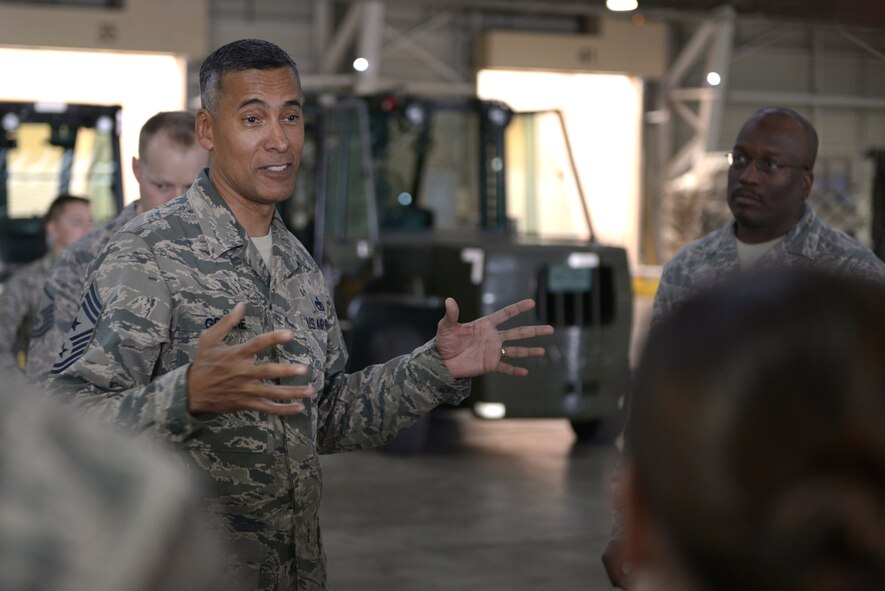 Chief Master Sgt. Terrence Greene, United States Forces, Japan and 5th Air Force command chief, speaks with Airmen during his immersion tour at Yokota Air Base, Japan, April 6, 2016. Greene now works alongside Lt. Gen. John Dolan, USFJ and 5AF commander, who he also served alongside with at the 451st Air Expeditionary Wing, Kandahar Airfield, Afghanistan, in 2013. As command chief, Greene is the senior enlisted advisor to Dolan. (U.S. Air Force photo by Staff Sgt. Cody H. Ramirez/Released)