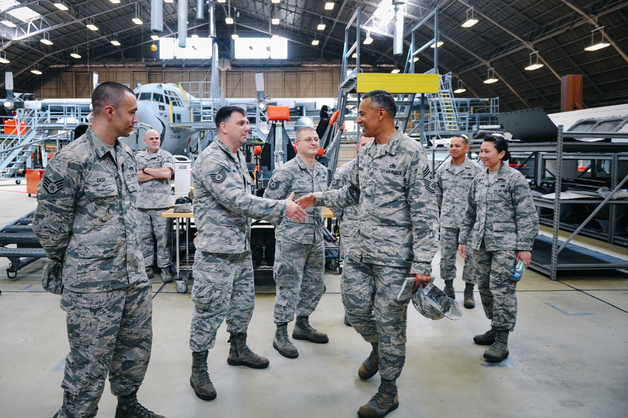 Chief Master Sgt. Terrence Greene, U.S. Forces, Japan and 5th Air Force command chief, introduces himself to Airmen of the 374th Maintenance Squadron isochronal inspection shop at Yokota Air Base, Japan, April 6, 2016. Greene now works alongside Lt. Gen. John Dolan, USFJ and 5AF commander, whom he also served alongside with at the 451st Air Expeditionary Wing, Kandahar Airfield, Afghanistan, in 2013. (U.S. Air Force photo by Senior Airman Delano Scott/Released)