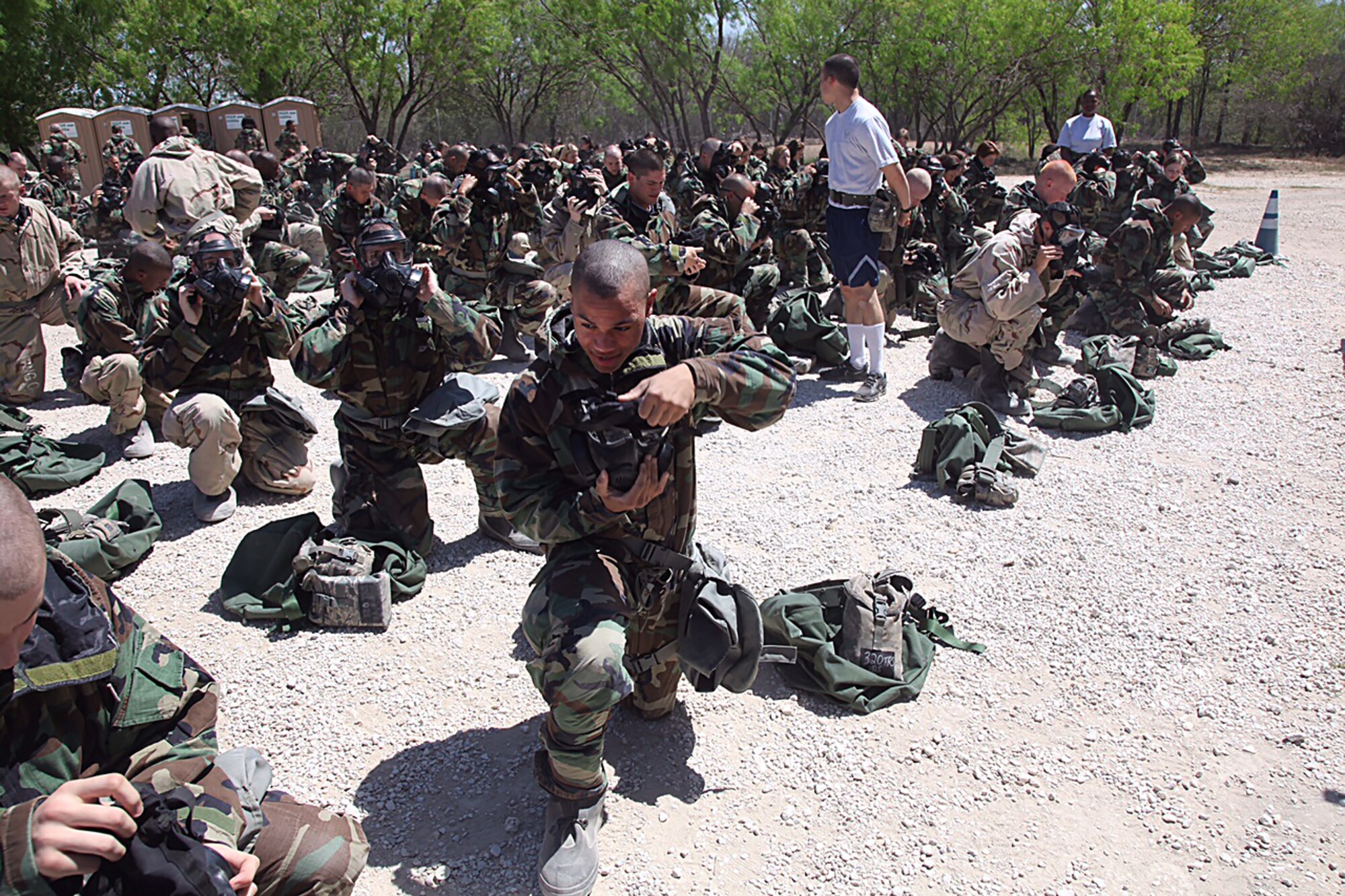 Jason Cathey dons a gas mask while in basic training April 28, 2014. Cathey, now a senior Airman with the 90th Security Forces Group, has been selected for the Senior Leader Enlisted Commissioning Program—Active Duty Scholarship Program, a new channel for Airmen wishing to earn a commission in the Air Force. (Courtesy photo)