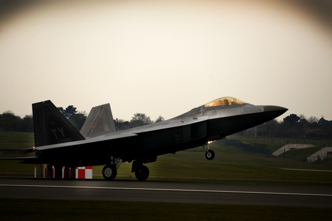 An F-22 Raptor from the 95th Fighter Squadron lands April 11, at Royal Air Force Lakenheath, England. The aircraft arrival marks the second time the U.S. European Command has hosted a deployment of F-22 aircraft in the EUCOM Area of Responsibility.  (U.S. Air Force photo/ Tech. Sgt. Matthew Plew)
