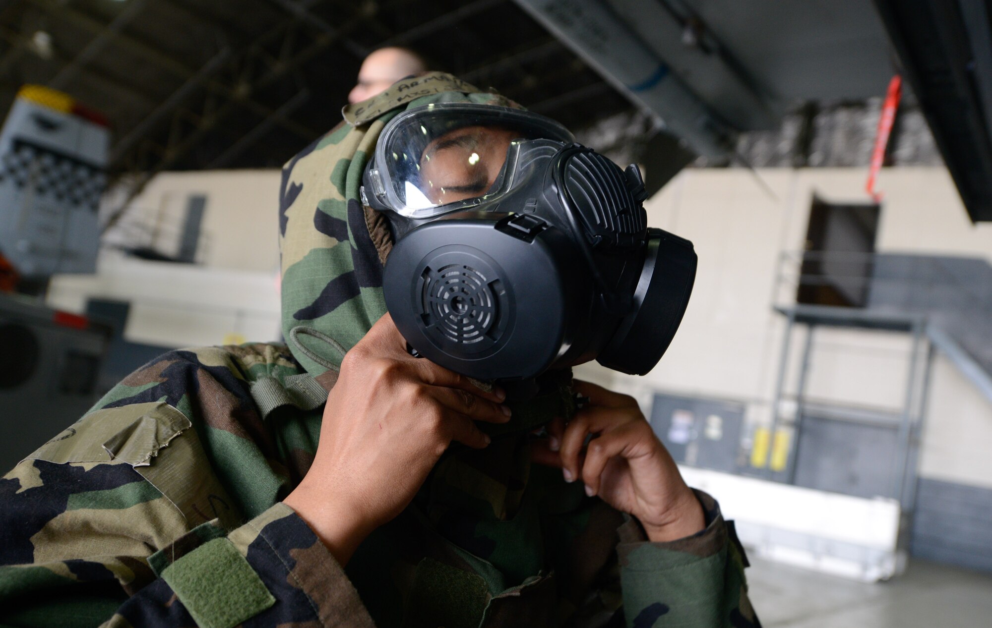 Airman Jamarcus Bell, 25th Aircraft Maintenance Unit weapons load crew member, prepares an AIM-9 Sidewinder missile to load onto an A-10 Thunderbolt II during a quarterly weapons load competition April 8, 2016, at Osan Air Base, Republic of Korea. Weapons load teams from the 25th and 36th AMUs competed by loading three training bombs and one missile onto their respective aircraft during the event. (U.S. Air Force photo by Senior Airman Dillian Bamman/Released)