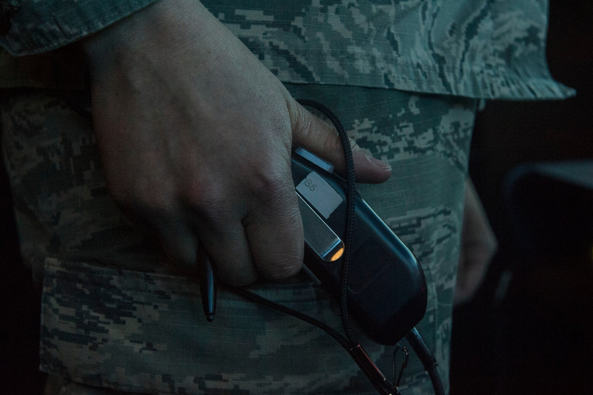 Airman 1st Class Latishia Reinert, a 5th Operations Support Squadron air traffic control journeyman, uses a headset radio to communicate with an aircraft during a simulated training exercise at Minot Air Force Base, N.D., April 6, 2016. Communication with the aircraft and vehicles on the flight line ensures safe and orderly flow of air traffic through Minot AFB. (U.S. Air Force photo/Airman 1st Class Jessica Weissman)