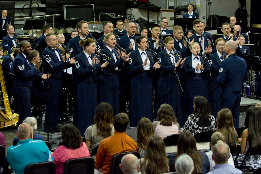 Members of the U.S. Air Force Singing Sergeants, perform at Little Rock Central High School, in Little Rock, Ark., Apr. 7, 2016. The United States Air Force Concert Band and Singing Sergeants are performing across five states during a 12-day spring tour to honor veterans, inspire citizenry and to heighten patriotism. (U.S. Air Force photo by Master Sgt. Jeff Walston/Released)