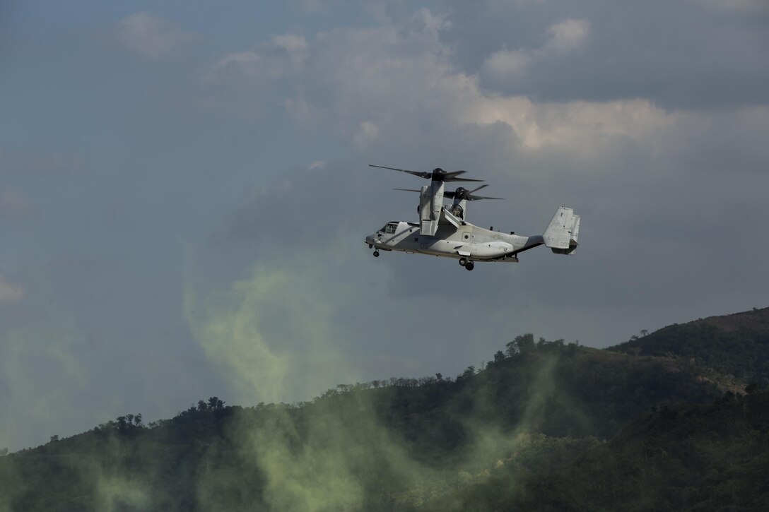 U.S. and Philippine Marines fly in a MV-22B Osprey to their drop off zone during Balikatan 16, at Crow Valley, Philippines, April 9, 2016. U.S. and Philippine Marines trained “shoulder-to-shoulder” after an aerial insert in ground assault maneuvers to build their combined capabilities. Balikatan is an annual Philippines-U.S. military bilateral training exercise that strengthens the Philippine-U.S. alliance and focuses on a variety of missions in response to conflict and crises throughout the Indo-Asia-Pacific region. (U.S. Marine Corps photo by Lance Cpl. Cameron Darrough/Released)